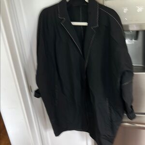 DONNA KARAN New York wool and nylon jacket. Slit pockets, white stitching